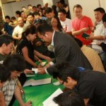 Verifying Green Book and membership dues.  Photos: Tashi Khongtsotsang