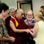 His Holiness the 14th Dalai Lama of Tibet greets Governor Neil Abercrombie and his wife, Dr. Nancie Caraway following the Hawaiian Cultural Panel