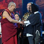 His Holiness the Dalai Lama greeting the artists who participated in the One World Concert at the Syracuse University on October 9th