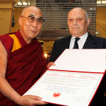 His Holiness the Dalai Lama is presented the Minority Award by South Tyrol President Luis Durnwalder in Bolzano, South Tyrol, Italy, on April 10, 2013. Photo/Alessandro Molinari