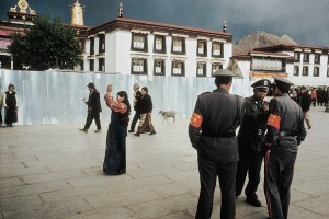 Pilgrims in the holy center of Lhasa are under strict police surveillance. 