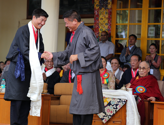 Speaker Penpa Tsering of the 15th Tibetan Parliament-in-Exile congratulating Sikyong Dr Lobsang Sangay. They were the final two candidates of the Sikyong election.